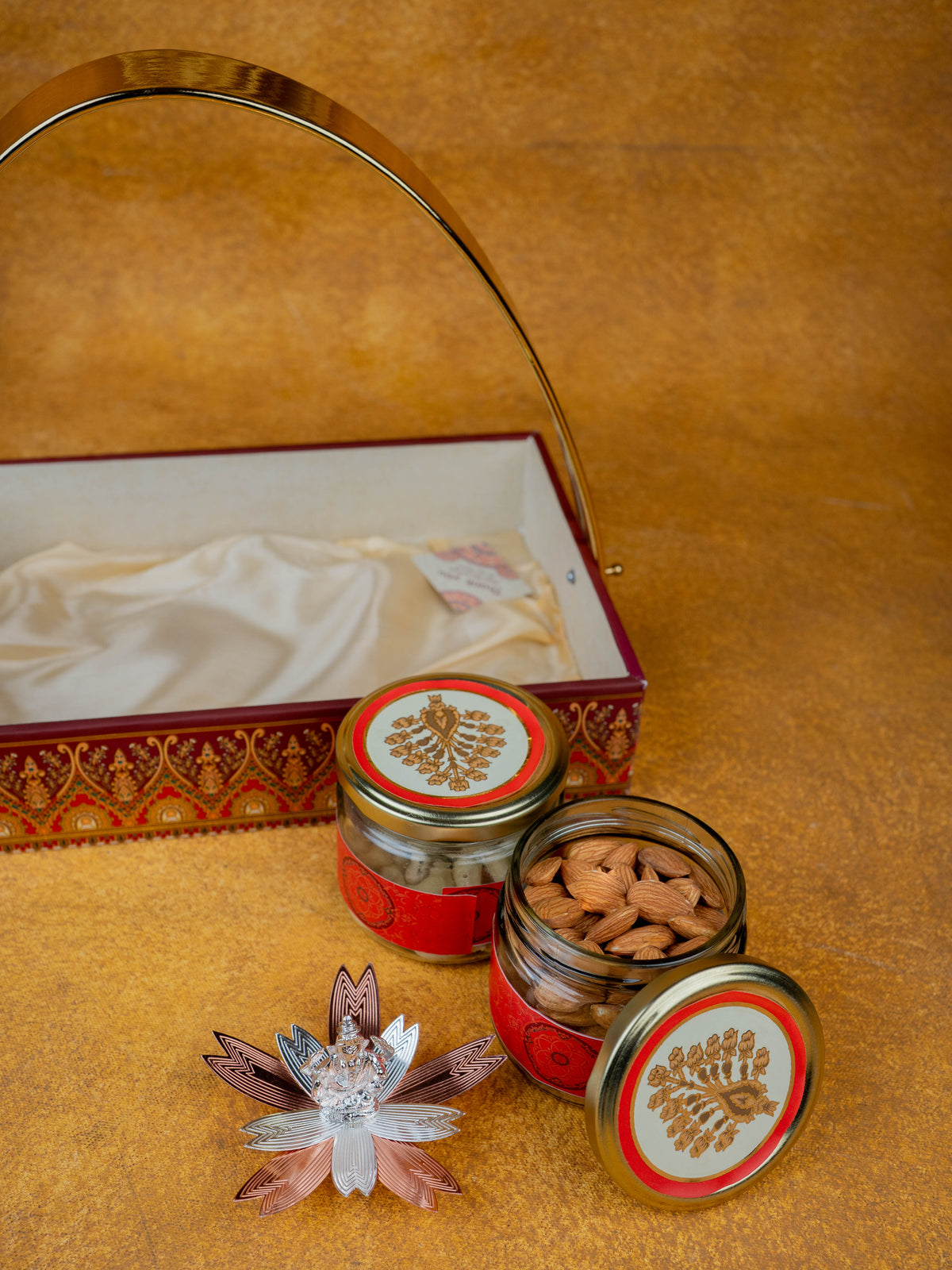 Deepavali: Tray with Set of 2 Glass Jar, 100Gms Cashew, Almond & German Silver Ganesha - WDC0009