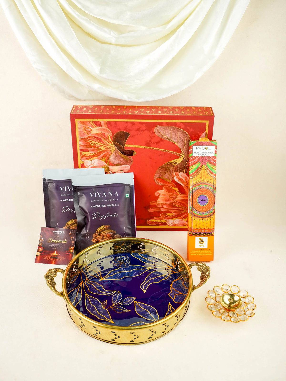 Deepavali: Box with Brass Floral Tray, Crystal Diya, Intense Sticks & Dry Fruits - WDC0026