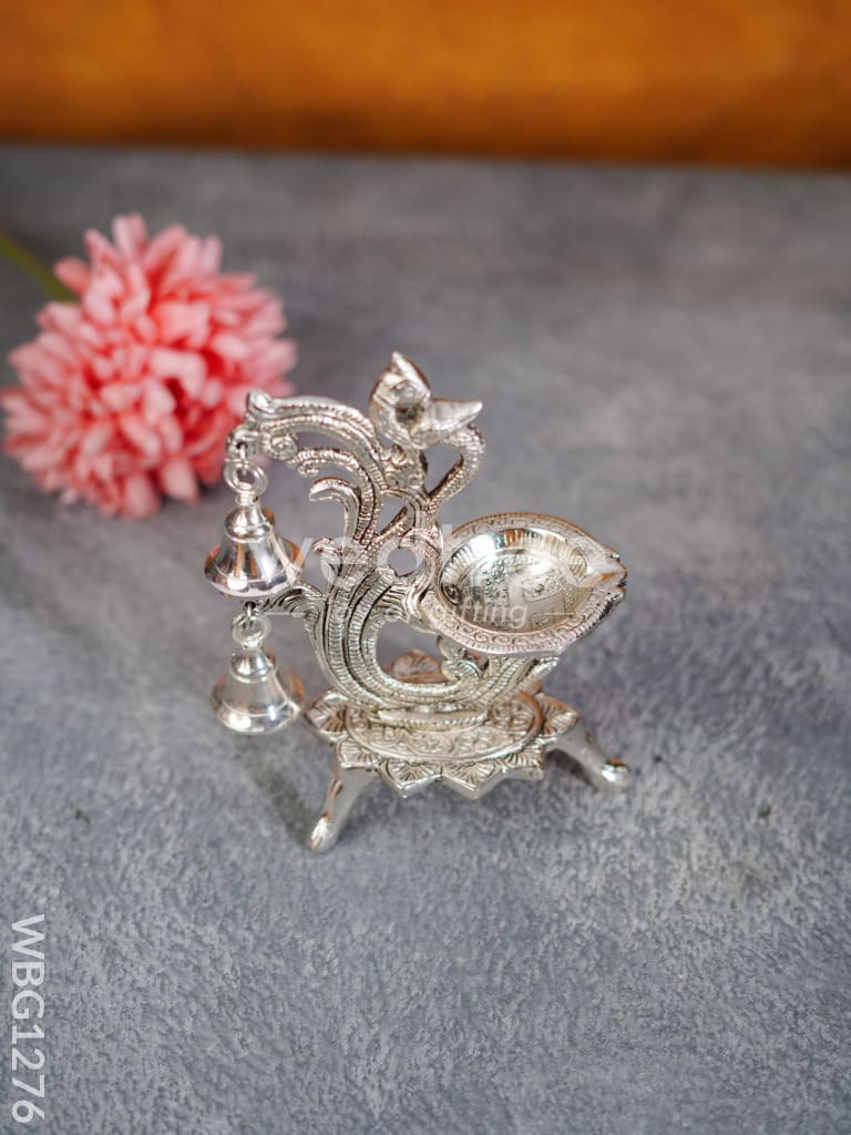 White Metal Chowki with Diya & Hanging Bells - WBG1276