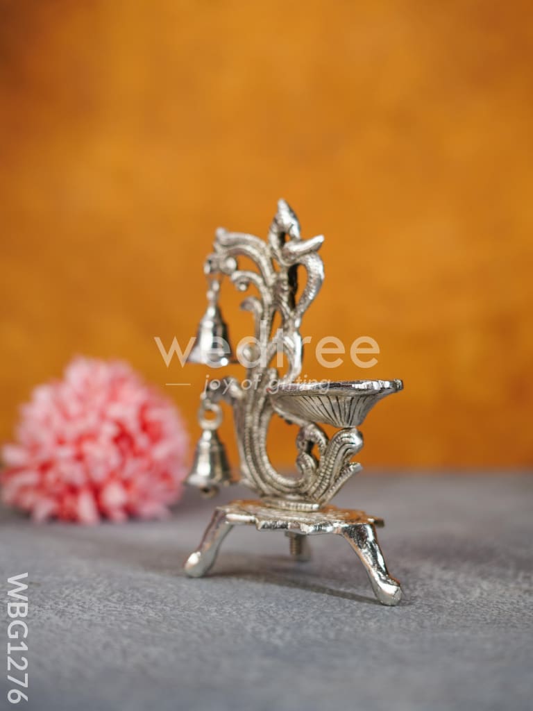 White Metal Chowki with Diya & Hanging Bells - WBG1276