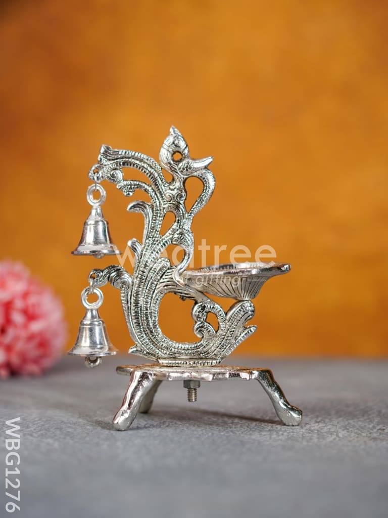 White Metal Chowki with Diya & Hanging Bells - WBG1276