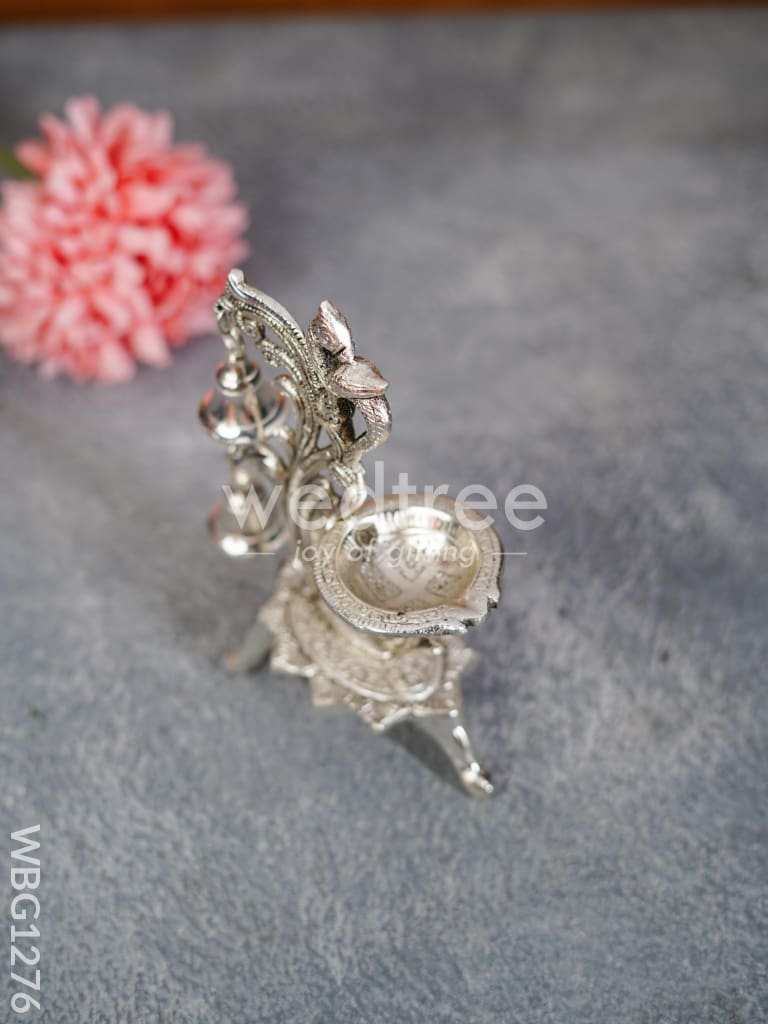 White Metal Chowki with Diya & Hanging Bells - WBG1276