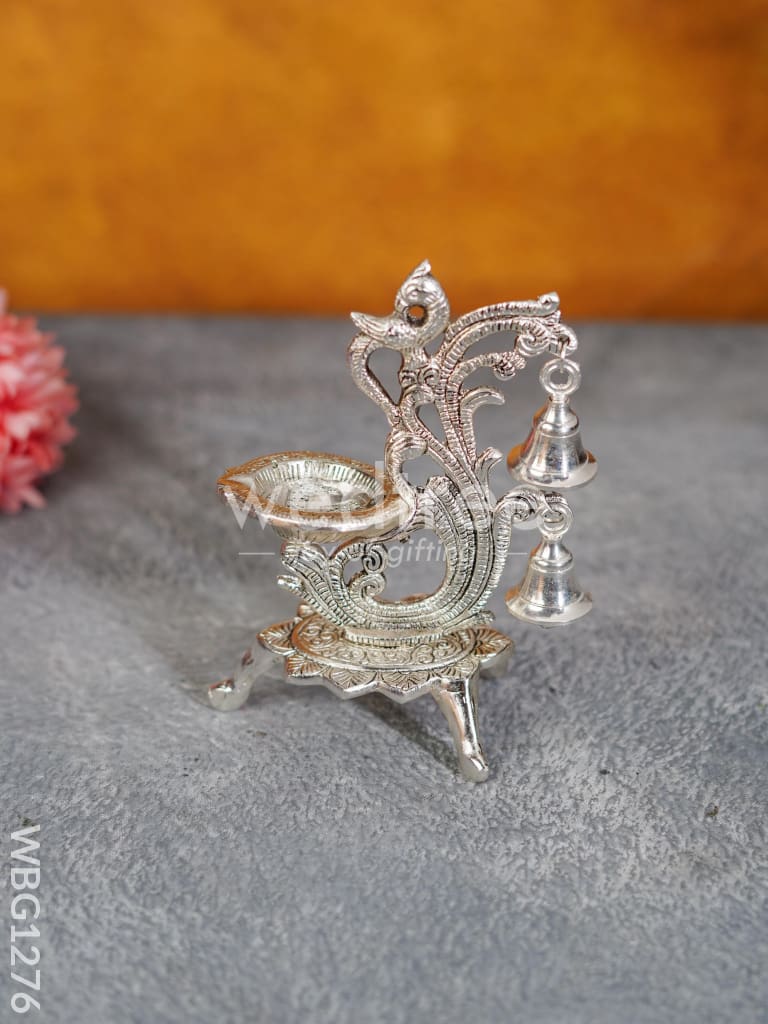 White Metal Chowki with Diya & Hanging Bells - WBG1276