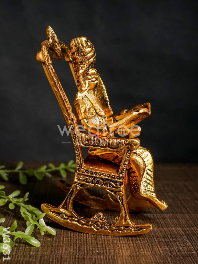 White metal Ganesha on chair Gold Finish - W3631