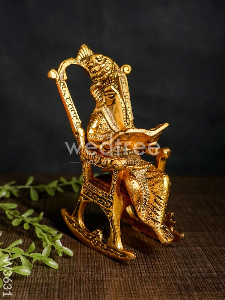 White metal Ganesha on chair Gold Finish - W3631