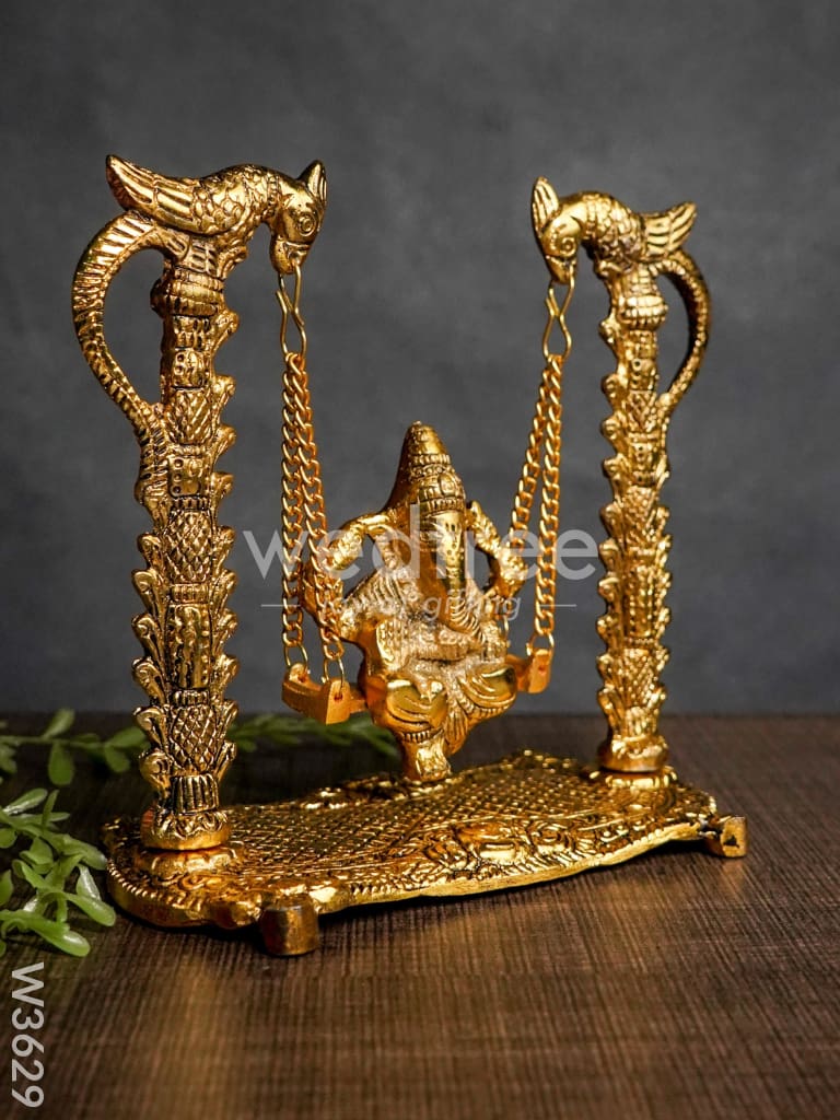 White Metal Ganesha on Swing gold Finish - W3629