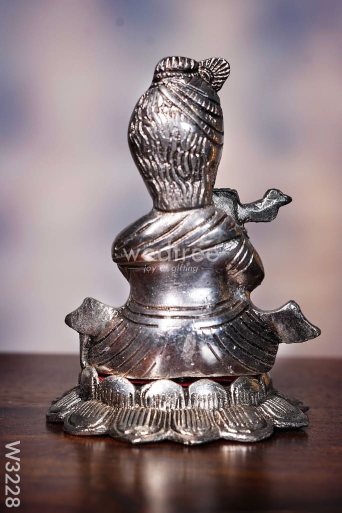 White metal Oxidised Bal Krishna on Lotus - W3228