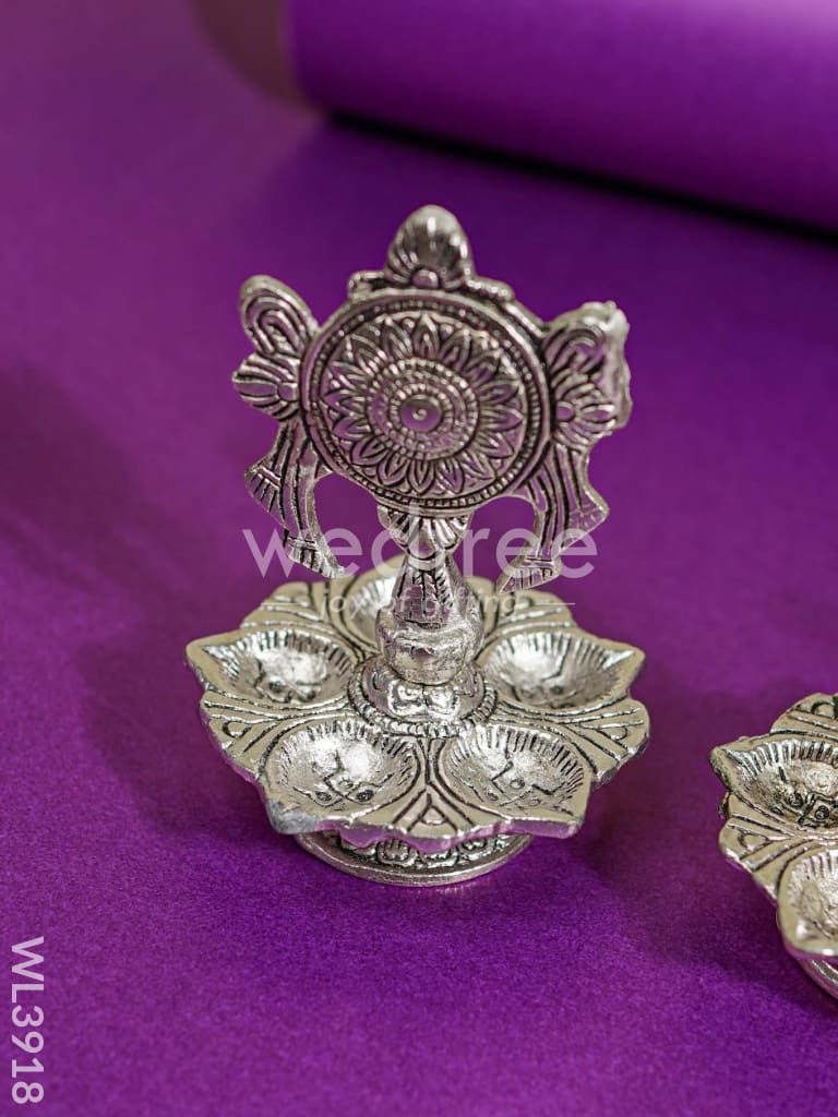 White Metal Shanku Chakra Diya - WL3918