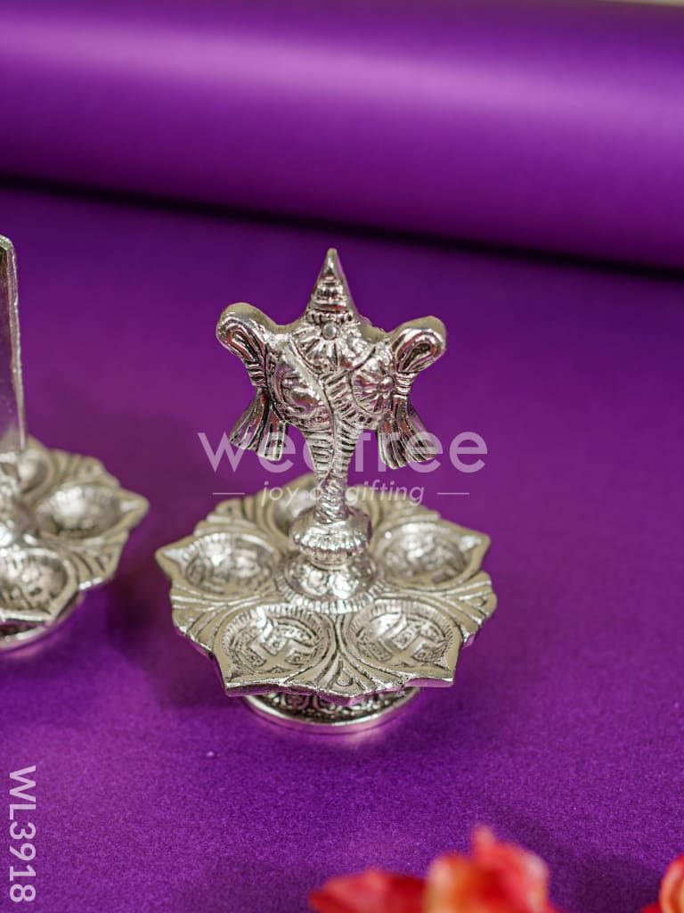 White Metal Shanku Chakra Diya - WL3918