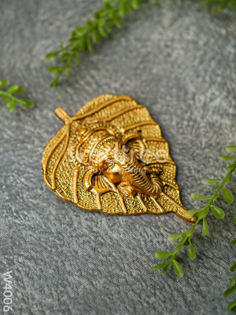 White Metal Wall Hanging Ganesha face on leaf - Gold Finish - W4006