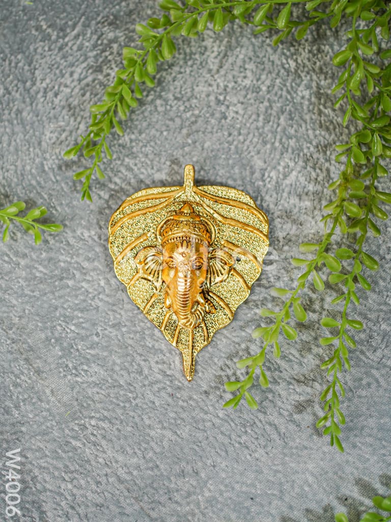 White Metal Wall Hanging Ganesha face on leaf - Gold Finish - W4006