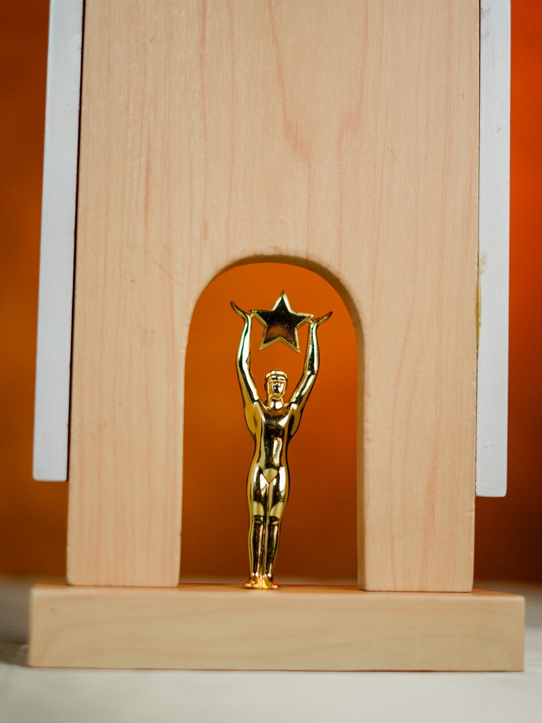 Wooden Trophy with Man Holding Star - 10 inch - BCG0218