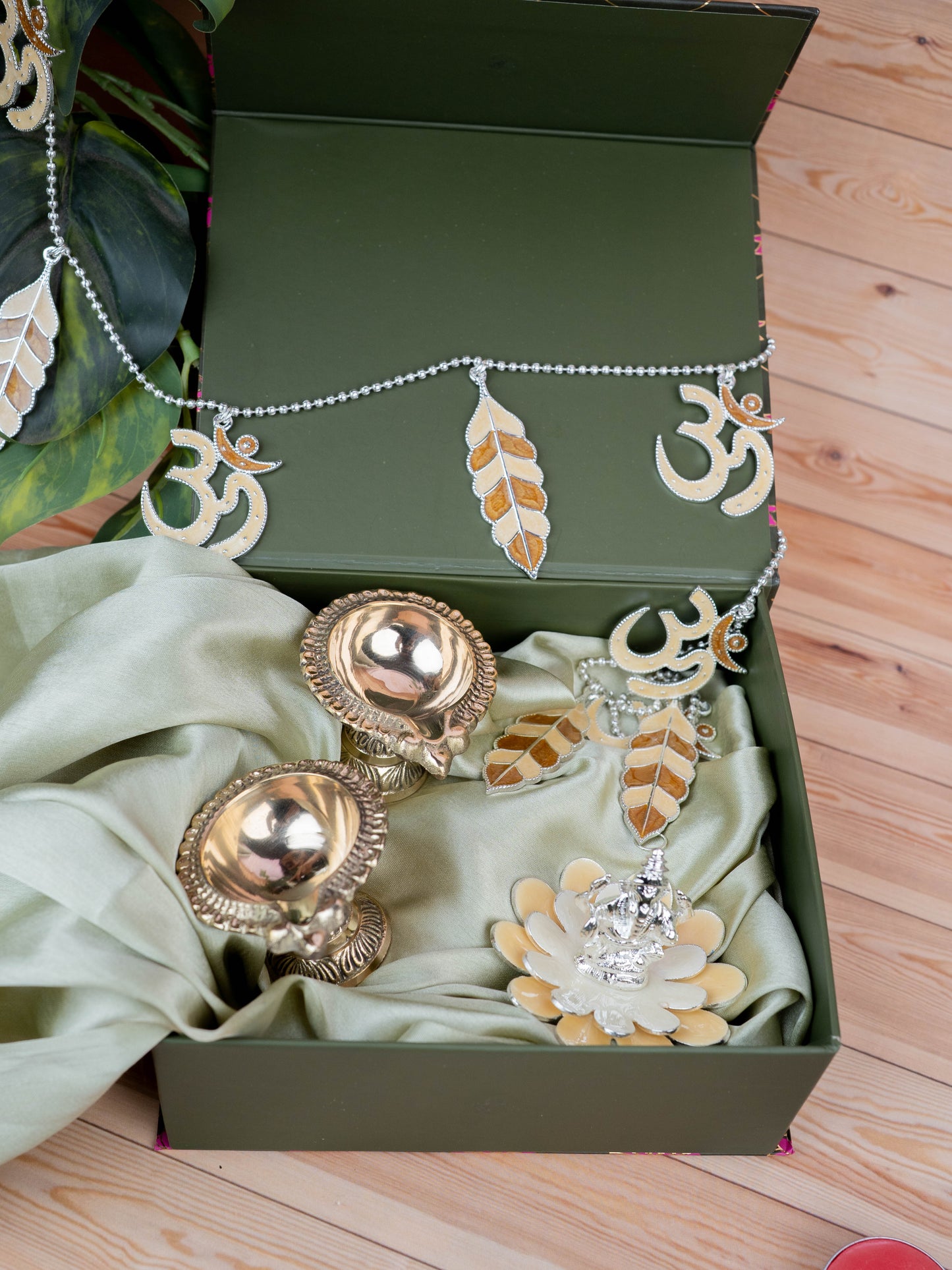Deepavali: Pichwai Box with German Silver Ganesha Idol, Thoran, Set of 2 Brass Diya - WDC0001