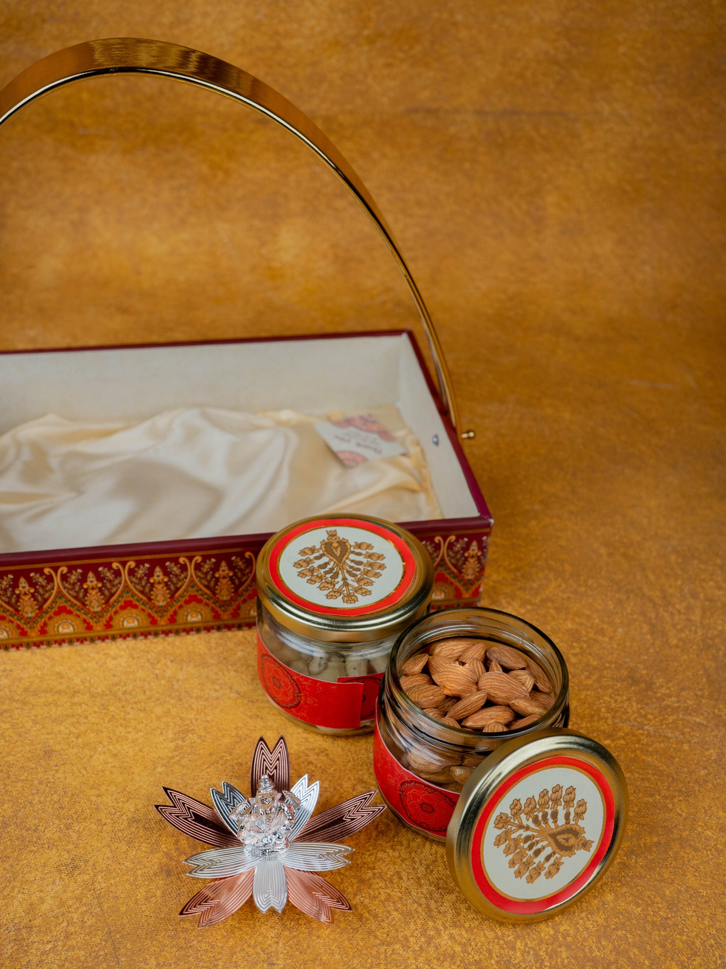 Deepavali: Tray with Set of 2 Glass Jar, 100Gms Cashew, Almond & German Silver Ganesha - WDC0009