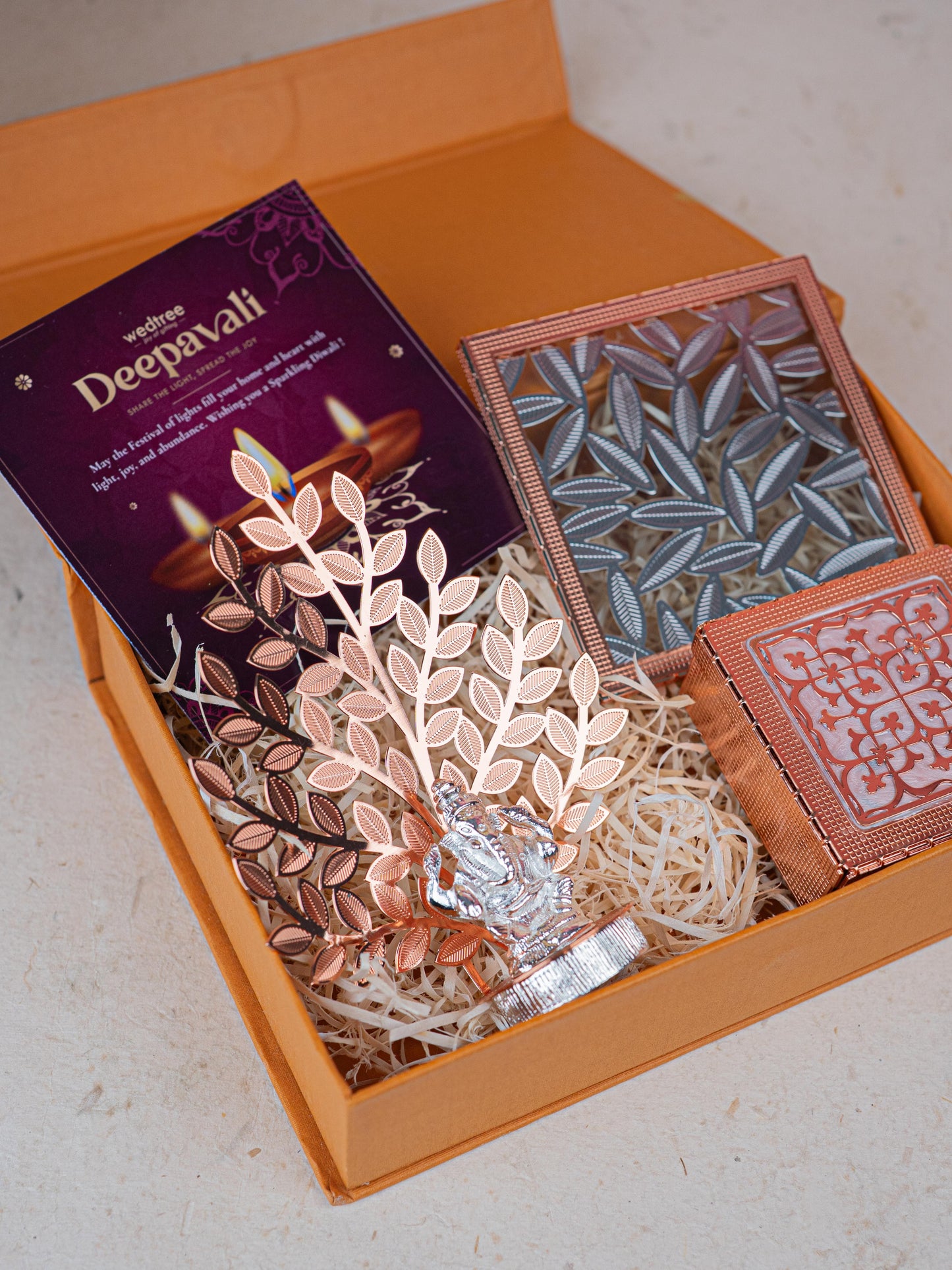 Deepavali: Box with Metal Box, Floral Coaster, Ganesha Idol with Tree - WDC0017