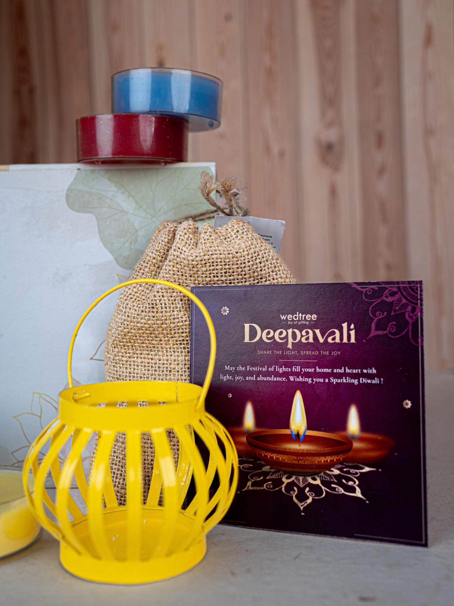 Deepavali: Box with Decorative Metal T-light Holder, 7 Chakra Scented Candle & Natural Fragrance Jute String Bag - WDC0021