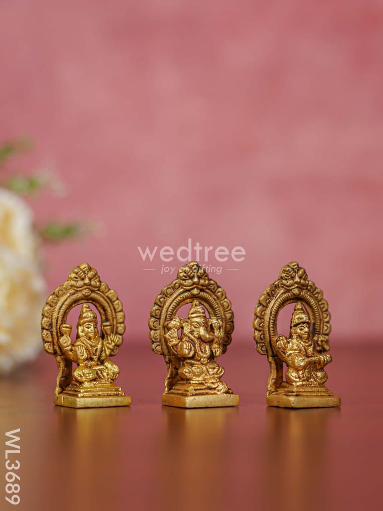 Brass Lakshmi Ganesha Saraswathi Idols in Frame - Set of 3 - WL3689