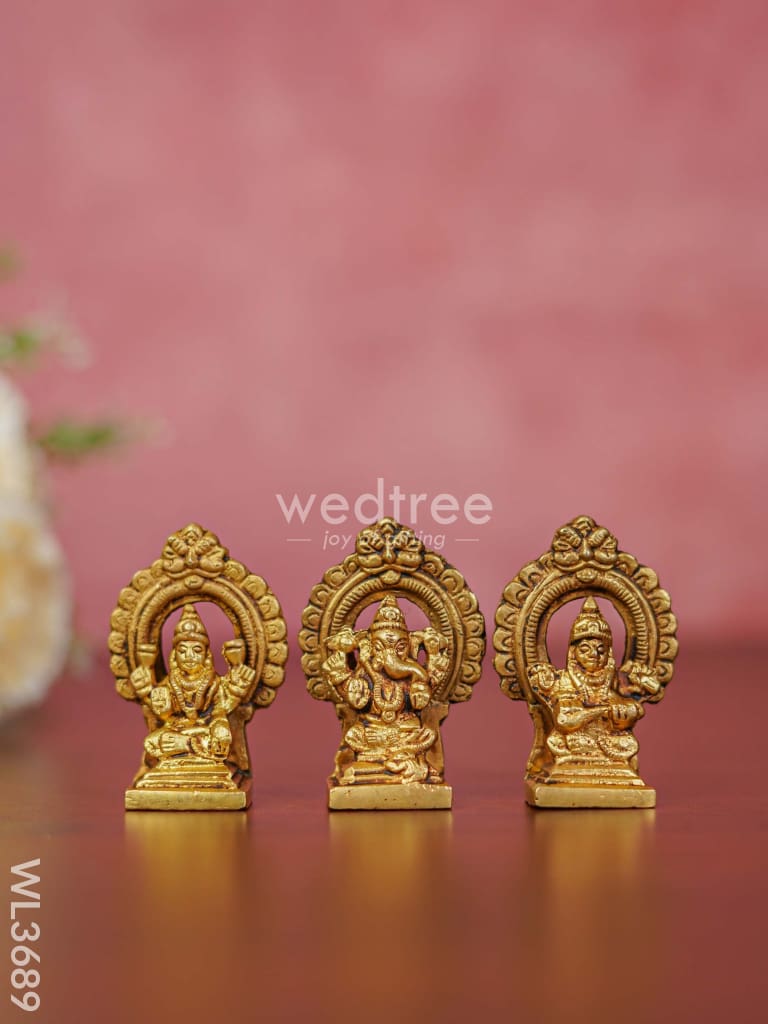 Brass Lakshmi Ganesha Saraswathi Idols in Frame - Set of 3 - WL3689