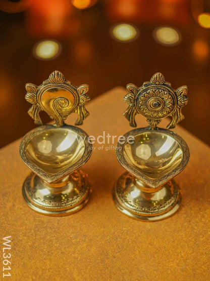 Brass Shanku Chakra Diya with Stand - Set of 2 - WL3611