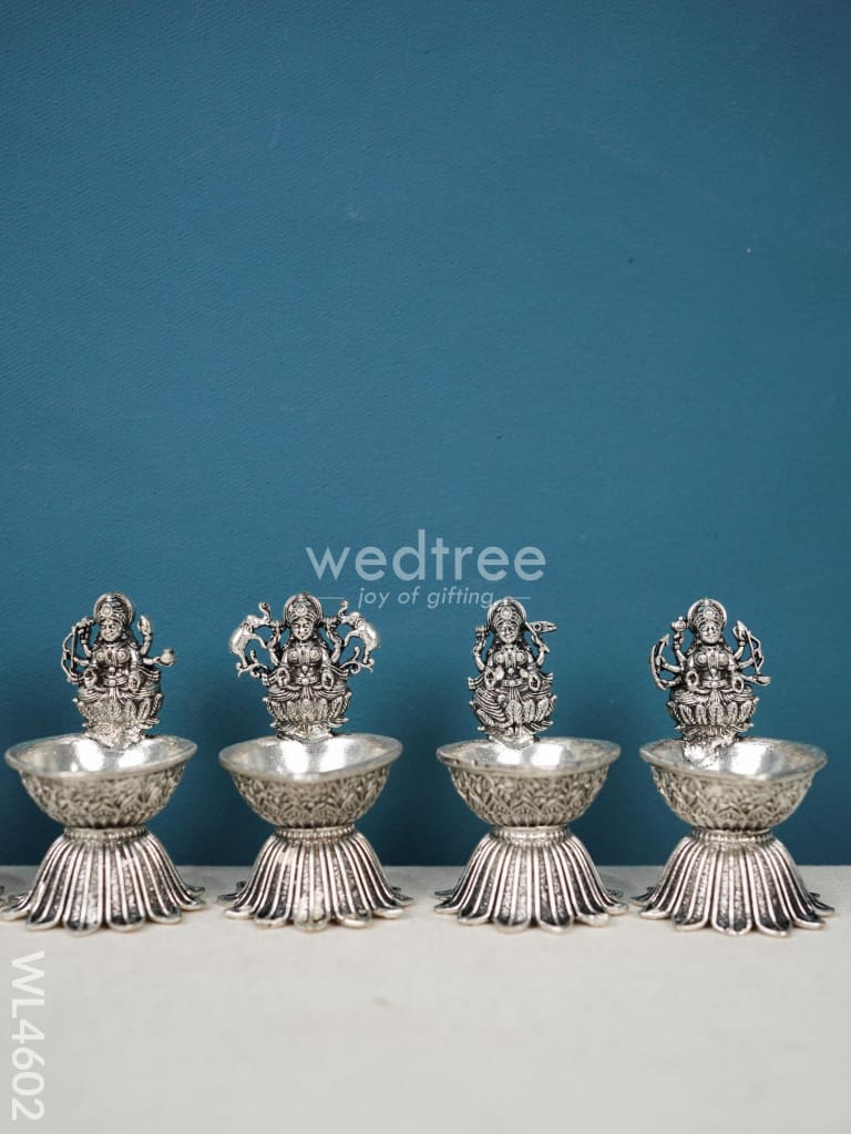 German Silver Ashtalakshmi Diya - Set of 8 - WL4602