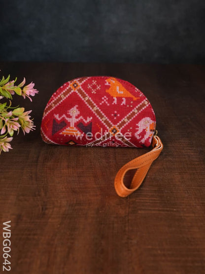 Printed Fabric Ikkat Hand pouch - WBG0642