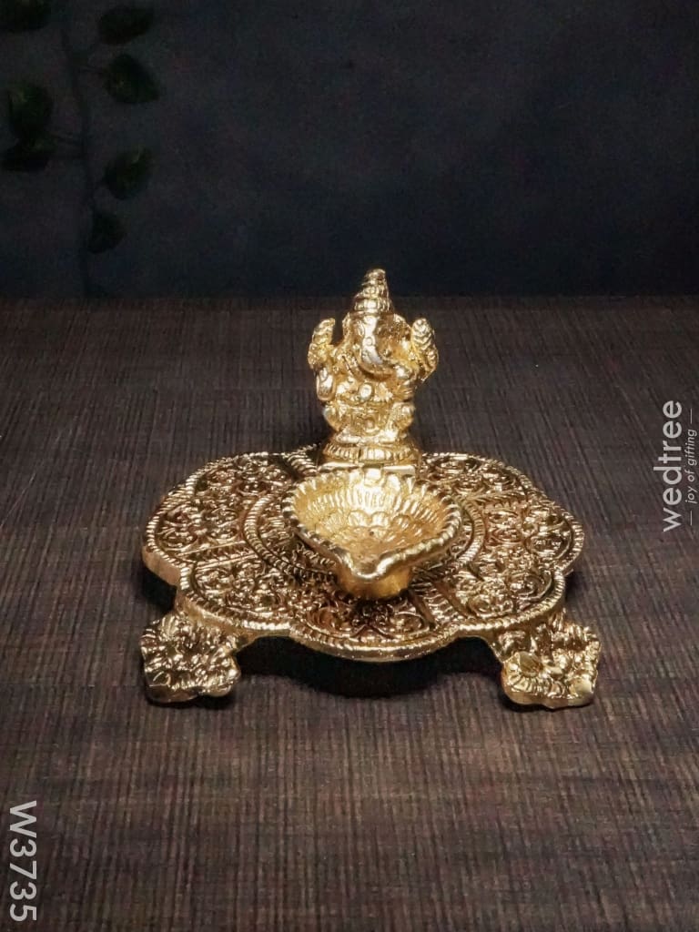 White Metal Chowki Ganesh With Diya Gold Finish - W3735 Diyas