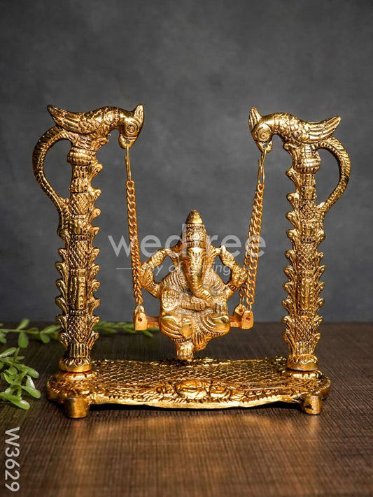 White Metal Ganesha on Swing gold Finish - W3629