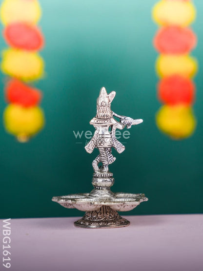 White Metal Krishna with Diya - WBG1619