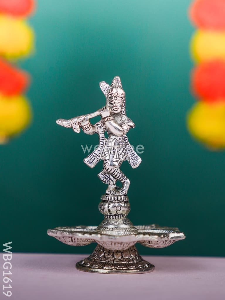 White Metal Krishna with Diya - WBG1619