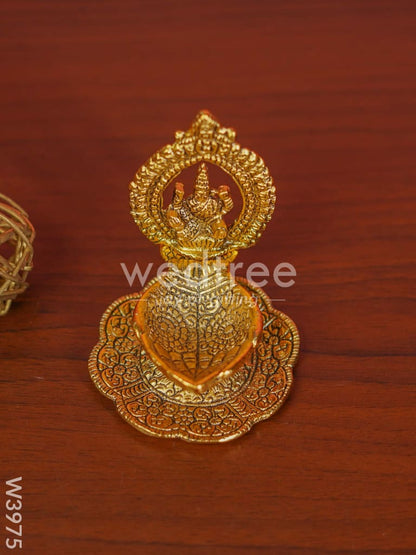 White Metal Lakshmi Hand Diya with Gold Finish - W3975