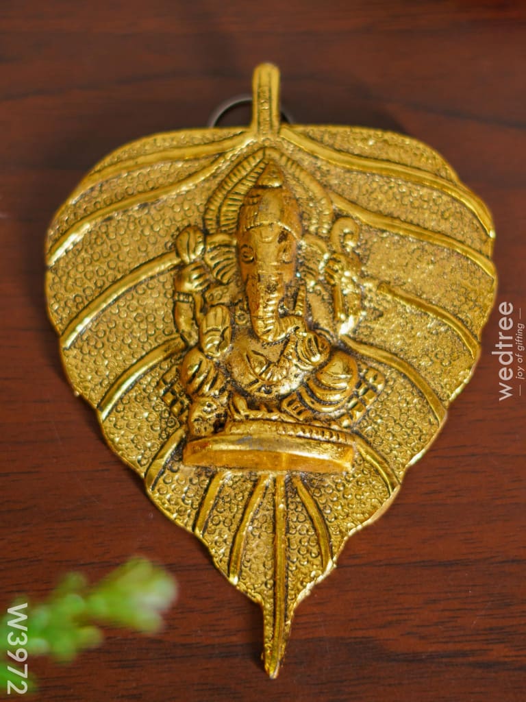 White Metal Pipal Leaf Ganesha Gold Finish - W3972 Divine Figurines